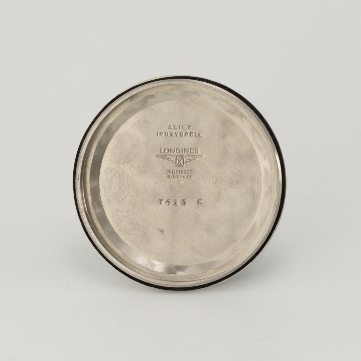 Inner screw back of the documented Longines specimen, visibly stamped 7413 6. Dial originality to this case is not independently certified. · Photo: Dr. Crott · © Dr. Crott, used with permission · Source: https://uhren-muser.de/archives/113/62274